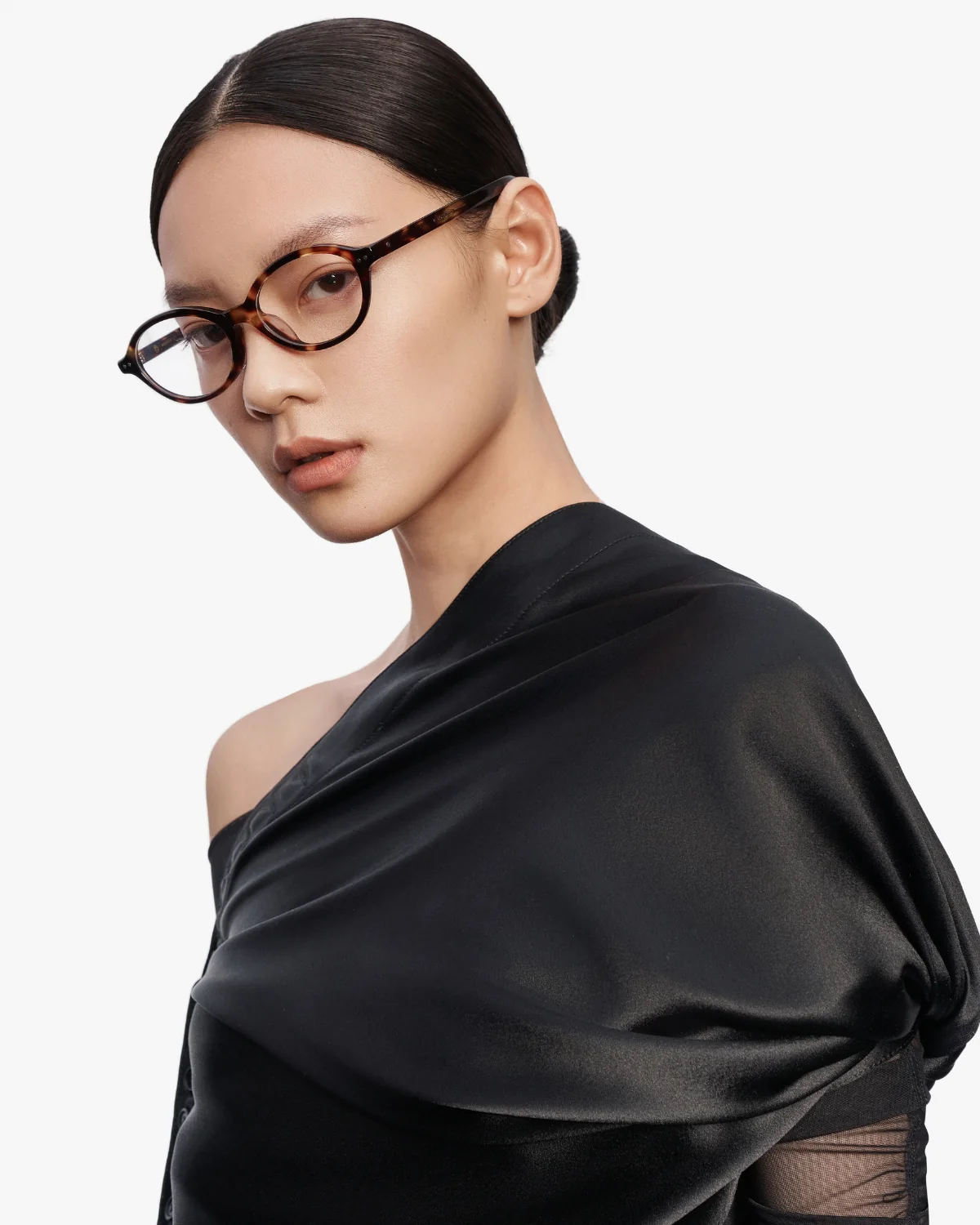 MUJOSH campaign model wearing optical frames